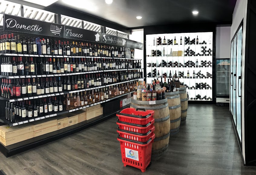 Curated wine wall inside Juicefly Wine and Spirits